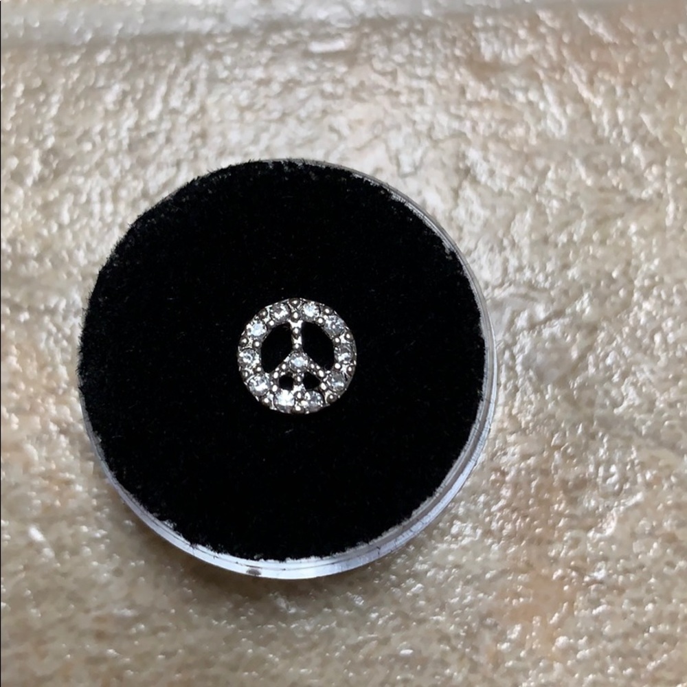 Never used origami owl rhinestone peace charm